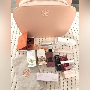 Travel size cosmetics! With pink  Armani cosmetic bag